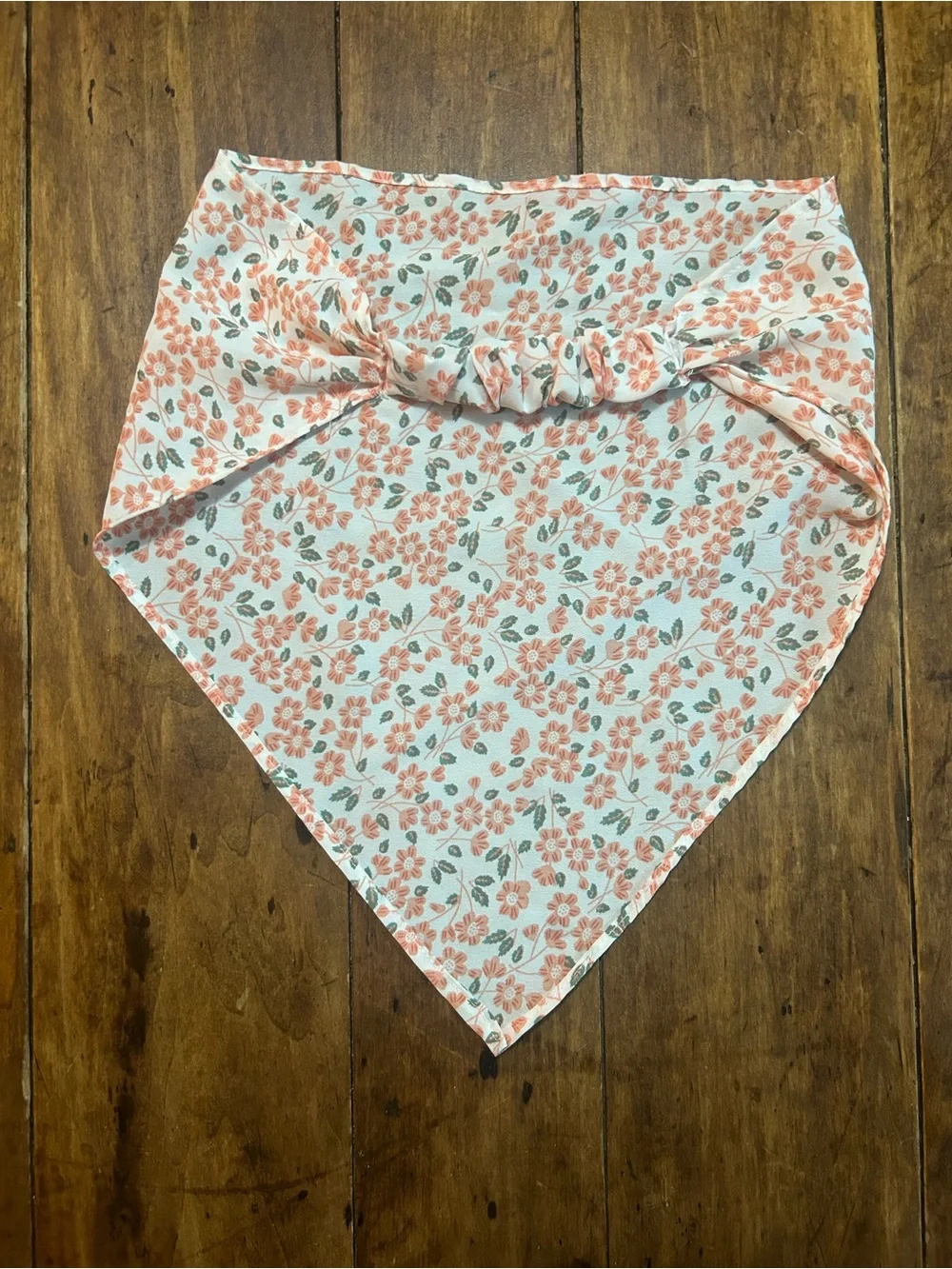 1 Floral blue pink and black Nike headband and 1 orange white and green headband